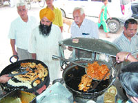 Gurdaas Ram Jalebian Wala at Ahuluwalia Katra in Amritsar has been selling jalebis for the last 50 years.