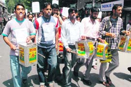 Jammu and Kashmir ITI diploma holders protesting against the state government for not fulfilling their long-pending demands in Srinagar on Tuesday. 