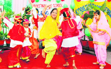 Students of Kiddies Paradise perform bhangra during a talent hunt competition in Ludhiana on Tuesday.