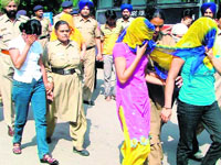 Girls, who were arrested from Hotel Moon and Venus, Sector 35, being produced in a court in Chandigarh on Wednesday.
