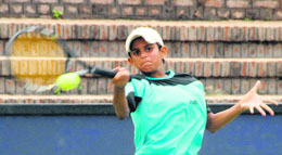 Samriti answers a shot during a match against Hasan Dhanoa in the AITA Talent Series Tennis Tournament being played at the CLTA courts, Chandigarh, on Wednesday.