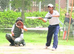 A striker hits the ball during selection trials to select the Punjab team for the forthcoming 30th Senior National Softball Championship, in Ludhiana, on Wednesday. 