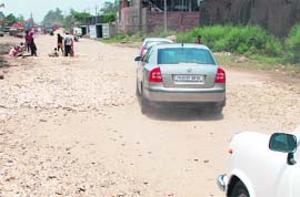 Roads around the dry port at Dhandari, Ludhiana, are in bad shape.