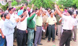 Bank staff demonstrates in Ludhiana on Wednesday.