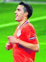Robin van Persie celebrates his goal