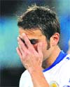 Romanian forward Adrian Mutu reacts at the end of the Euro 2008 Championships Group C football match against Netherlands on Tuesday. Holland beat Romania, a result which sent the Romanians crashing out of Euro 2008. 