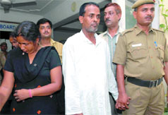 Asfaq and Vishakha (L) who were arrested for duping people in the name of black magic in New delhi on Thursday.
