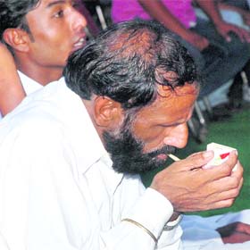 A participant smokes at an anti-addiction day function organised by the Youth Congress on the occasion of the birthday of AICC general secretary Rahul Gandhi