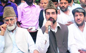Chairman of the moderate faction of the All-Party Hurriyat Conference Mirwaiz Omar Farooq and chairman of the hardliner faction of APHC Syed Ali Shah Geelani and Shabir Ahmad Shah talking to mediapersons in Srinagar on Thursday. 