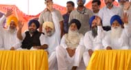 SAD chief Sukhbir Singh Badal and other senior leaders of the party raise their hands in support of the programmes and policies of Chief Minister Parkash Singh Badal during MC election rally in Bathinda