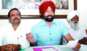 Bholath MLA Sukhpal Singh Khaira addressing a press conference in Jalandhar on Friday.