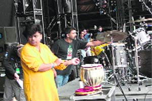 Shambhu of rock band Parikrama using tabla during a live performance