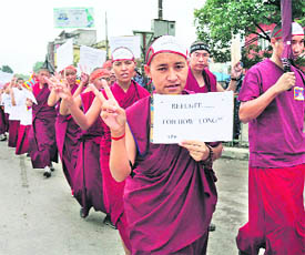 Tibetan refugees living in Nepal take part in a rally on the World Refugee Day in Kathmandu on Friday.