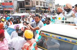 Ripjit Singh Brar, MLA, Kotkapura, addressing a rally at Kotkapura on Saturday. Tribune photo: Kulbir Beera