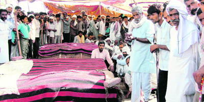 Bodies of the Gujjars killed in clashes held back at the protest site in Sikandra to keep the movement going.