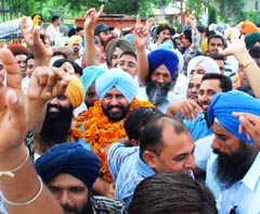 Baljeet Singh Bir Behman (top) of SAD being taken out in procession after winning BMC election, which was held in Bathinda on Sunday.