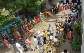 Electorates queue up to exercise their voting rights outside a polling booth for the Municipal Corporation elections in Bathinda on Sunday.