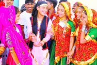 Participants from Gujarat interact with Himachali participants at a national integration camp at Sector 20, Chandigarh, on Sunday.