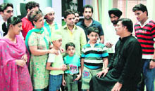 Doordarshan newsreader Shammi Narang interacts with students of Mad Arts in Mohali.
