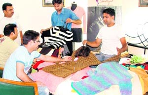 Hosiery manufacturers show samples to buyers in Ludhiana on Sunday.