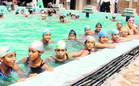 Aspirants prior to the start of trials held at MC pool, Ludhiana, on Sunday