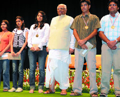 Lok Sabha speaker Somnath Chatterjee poses with the winners of the Meritorious Awards  2007 given for outstanding performance at the national level entrance examination, at a function held at Balayogi Auditorium, Parliament House in New Delhi on Monday.