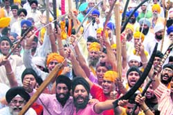Sikhs hold a protest against Dera Sacha Sauda chief Gurmeet Ram Rahim Singh in Karnal 