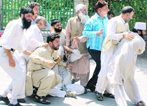 Supporters of the Hurriyat Conference during a demonstration in Srinagar 