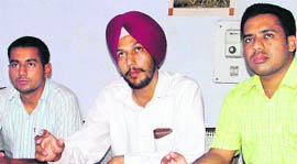 Hira Singh, Gurpreet Singh Brar and Hardeep Singh share their views on the promotion of agriculture education in villages in Ludhiana on Monday.