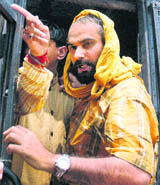 Navjot Singh Sidhu being taken away after he was arrested in Chandigarh for protesting against price rise. The police lathicharged and water-cannoned BJP workers led by Sidhu when they attempted to breach the barricades and proceed towards Raj Bhawan.