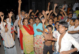 Residents protest outside the PSEBs complaint office at Paras Ram Nagar in Bathinda on Tuesday night.