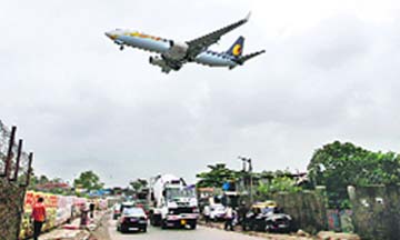 A Jet Airways aircraft prepares to land at the Mumbai Airport