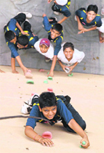 Students try their hand at rock-climbing at MCM DAV College in Sector 36 in Chandigarh on Tuesday. 