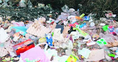 Medical waste, polythene bags and discarded plastic items dumped in the open near one of the medical institutions in Kangra
