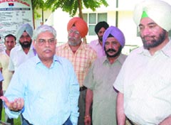 Principal secretary, defence services welfare, A.R. Talwar talks to mediapersons at the sainik welfare office in Jalandhar on Tuesday. 