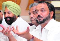 Markfed chairman and Congress MLA Harminder Singh Jassi at a press conference in Bathinda on Tuesday.