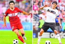 Turkish midfielder Hamit Altintop and (R) German midfielder Michael Ballack