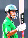 Mohammad Ashraful raises his bat after scoring a century during a Group A match between Bangladesh and the United Arab Emirates for the Asia Cup in Lahore