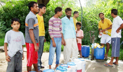 Residents line up to get water for domestic purposes as the water supplied by Faridkot waterworks is not fit for drinking