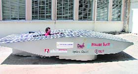 A picture released by the American University of Beirut press office on Wednesday shows engineering student reversing the first solar-powered Arab-manufactured car on the universities campus