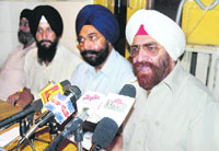 Members of various Sikhs organisations address mediapersons in Jammu on Wednesday.