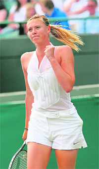 Maria Sharapova had the shorts of a man and played like a lady who means business in the first round match of the Wimbledon Championships against Stephanie Foretz on Tuesday. 