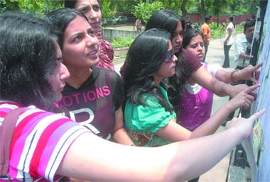 Students check the list at Hindu College in New Delhi on Thursday.