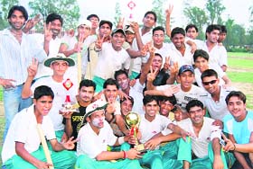 Jubilant Uttrakhand team after defeating Maharashtra in the final of the Ist Senior National 20 Cricket Tournament held at PAU in Ludhiana