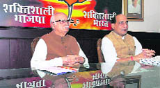 BJP leader L.K. Advani and party president Rajnath Singh during the party's central election committee meeting in New Delhi on Thursday.