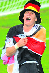 German midfielder Bastian Schweinsteiger celebrates at the end of the semifinal match.