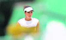 Sania Mirza waits for her Spanish opponent Maria Jose Martinez Sanchezs serve during their 2008 Wimbledon championship match in London on Thursday.