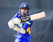 Sri Lankas Mahela Jayawardene hits a stroke during a match for the Asia Cup at Gaddafi Stadium in Lahore on Thursday.