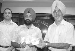 Punjab DGP N.P.S. Aulakh releases Punjabi video ''Sohniyan Punjabna'' by Dr Gurmel Chahal in Mohali on Friday.