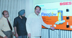 Delhi power minister A.K. Walia with BSES CEO Arun Kanchan and Delhi education minister Arvinder Singh Lovely launches the energy-efficient CFLs of BSES in New Delhi